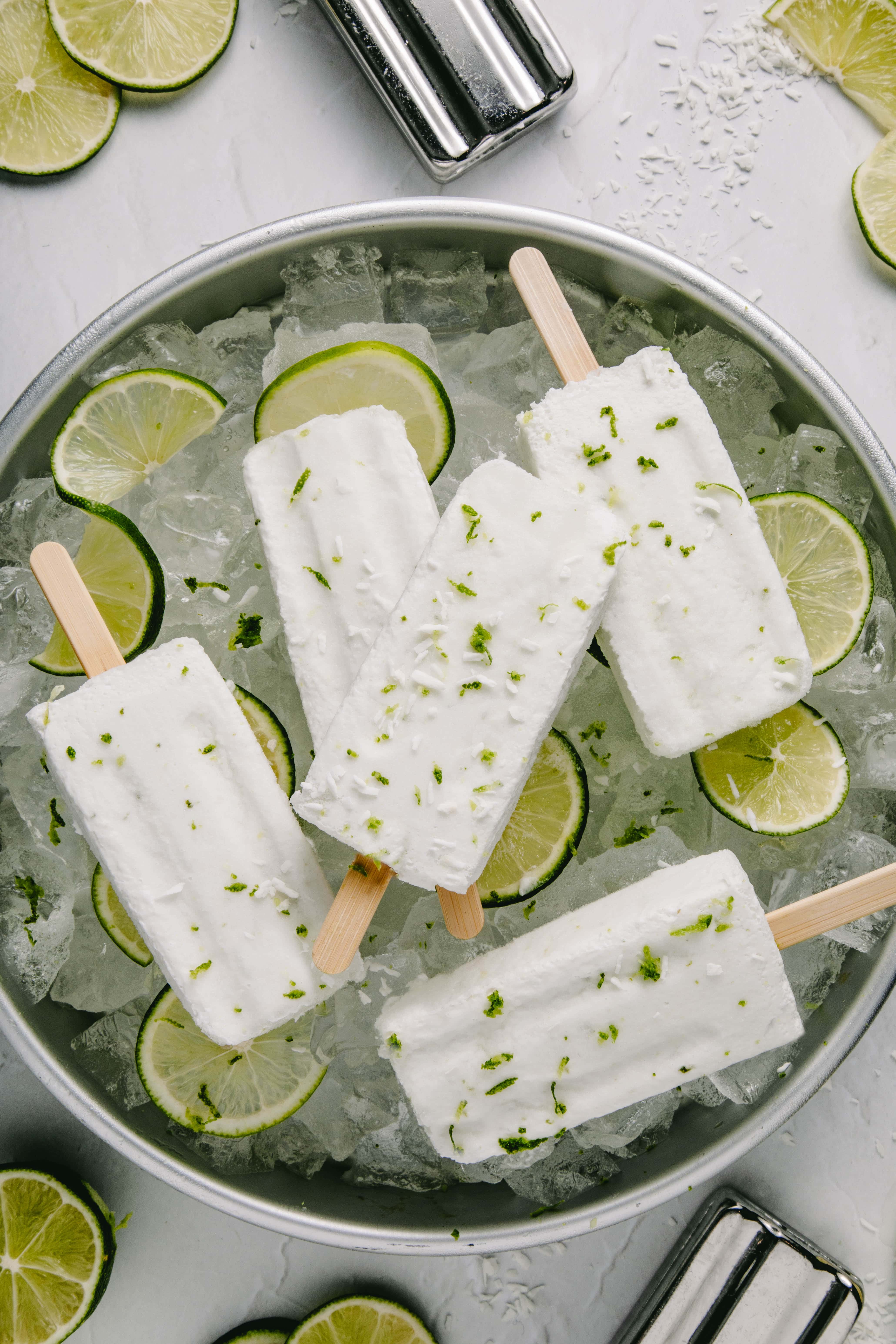 Margarita Popsicles in a bowl by Cashmere & Cocktails
