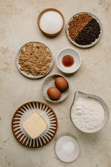 Overhead view of ingredients listed in the recipe in various bowls and plates.